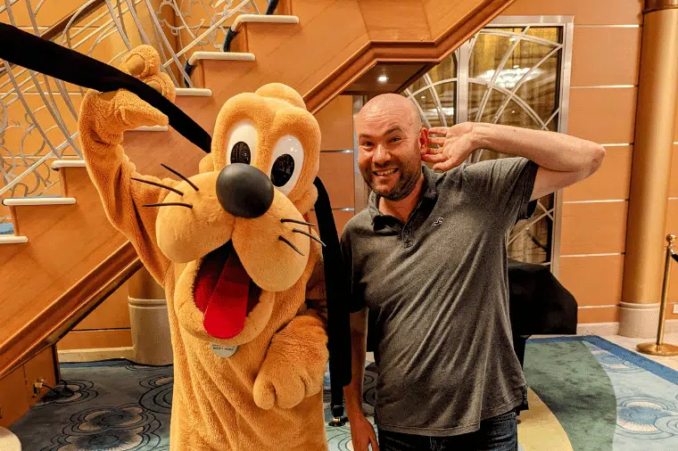 One of our Disney Cruise Experts Martin meeting our favourite pup, Pluto